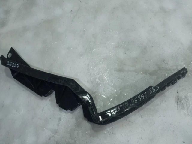 bontott SKODA OCTAVIA II Jobb első Lökhárító Tartó (Műanyag)