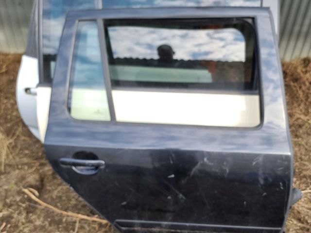 bontott SKODA OCTAVIA II Jobb hátsó Ajtó (Üres lemez)
