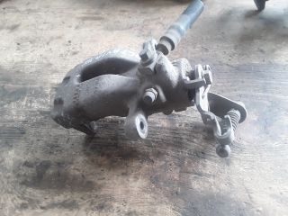 bontott SKODA OCTAVIA III Bal hátsó Féknyereg Munkahengerrel