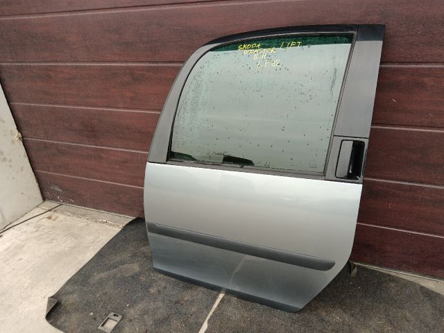 bontott SKODA ROOMSTER Bal hátsó Ajtó (Részeivel)