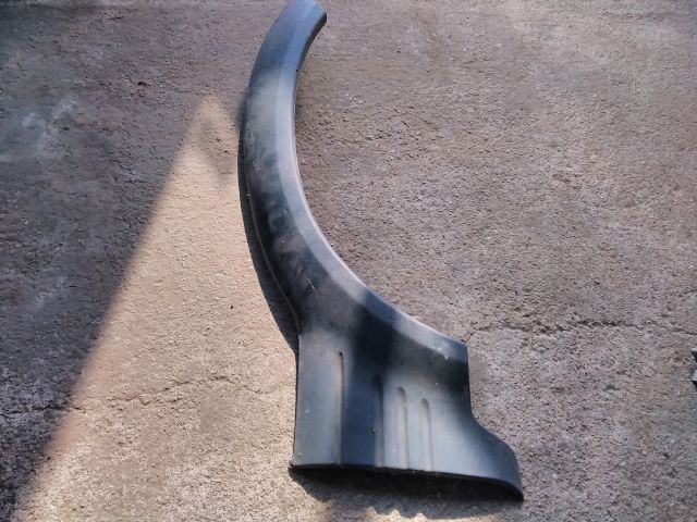 bontott SSANGYONG MUSSO Műanyag Sárvédő Ív Díszléc