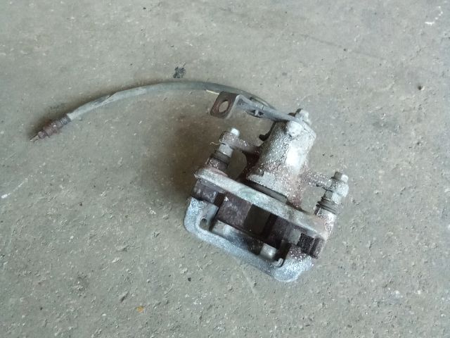 bontott SSANGYONG TIVOLI Bal hátsó Féknyereg Munkahengerrel