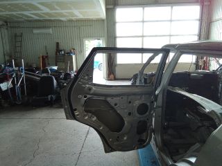 bontott SSANGYONG TIVOLI Bal hátsó Ajtó (Üres lemez)