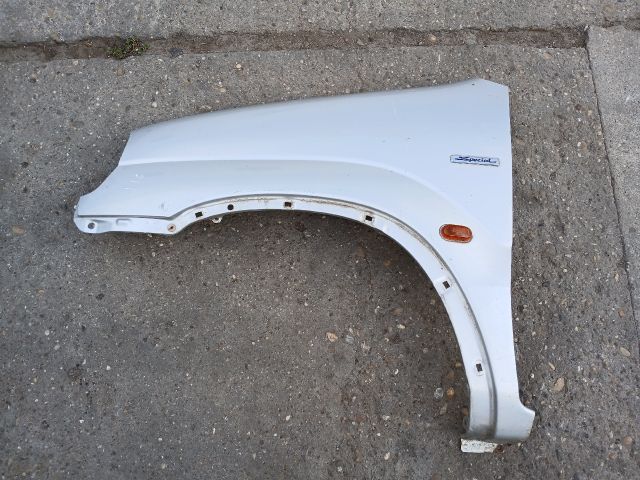 bontott SUZUKI IGNIS I Bal első Sárvédő