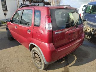 bontott SUZUKI IGNIS I Bal hátsó Dobbetét (Kerékjárati, Műanyag)