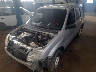 bontott SUZUKI IGNIS II Bal hátsó Rugó