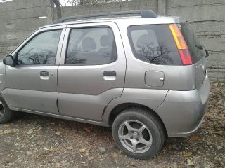 bontott SUZUKI IGNIS II Jobb első Rugó