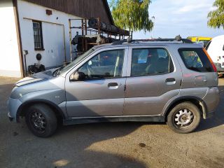bontott SUZUKI IGNIS II Bal hátsó Gumikéder