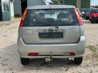 bontott SUZUKI IGNIS II Bal hátsó Sárvédő