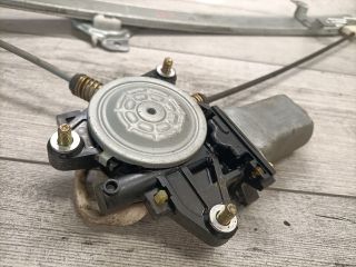 bontott SUZUKI LIANA Bal első Ablakemelő Szerkezet (Elektromos)