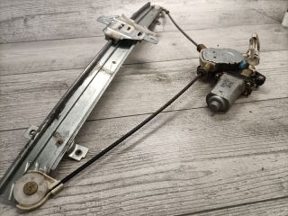 bontott SUZUKI LIANA Bal első Ablakemelő Szerkezet (Elektromos)