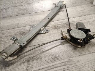 bontott SUZUKI LIANA Bal első Ablakemelő Szerkezet (Elektromos)