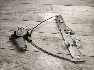 bontott SUZUKI LIANA Bal hátsó Ablakemelő Szerkezet (Elektromos)