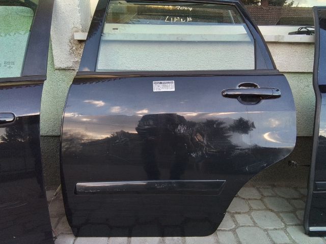 bontott SUZUKI LIANA Bal hátsó Ajtó (Részeivel)