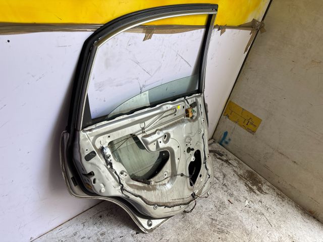 bontott SUZUKI LIANA Bal hátsó Ajtó (Üres lemez)