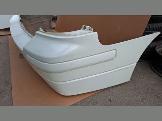 bontott SUZUKI LIANA Hátsó Lökhárító (Részeivel)