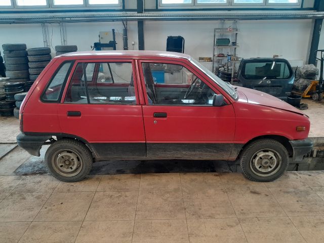 bontott SUZUKI MARUTI Motor Tartó Bak Bal