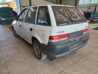 bontott SUZUKI SWIFT II Bal első Gólyaláb (Lengécsillapító, Rugó)