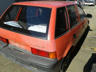 bontott SUZUKI SWIFT II Bal hátsó Rugó