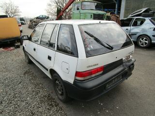 bontott SUZUKI SWIFT II Bal első Rugó