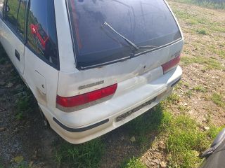 bontott SUZUKI SWIFT II Jobb hátsó Rugó