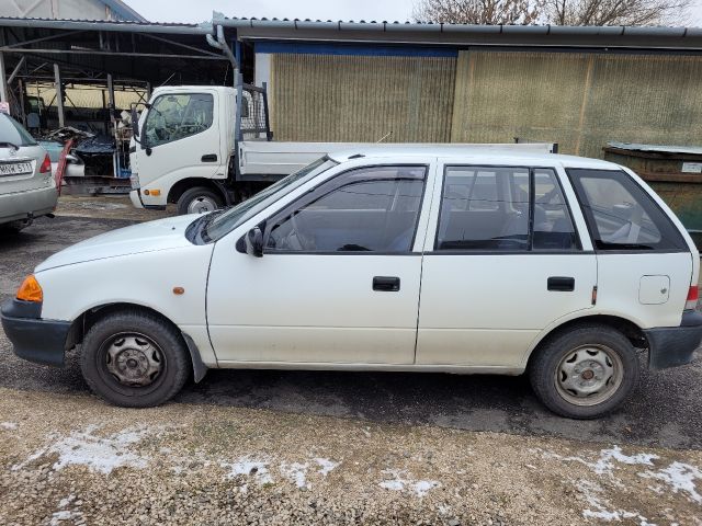 bontott SUZUKI SWIFT II Tankbetöltő Cső (Fém)