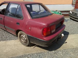 bontott SUZUKI SWIFT II Bal hátsó Rugó