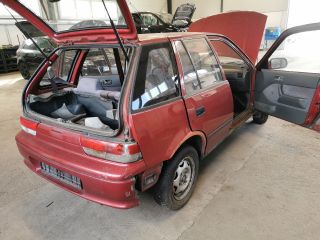 bontott SUZUKI SWIFT II Bal első Ablakemelő Szerkezet (Elektromos)