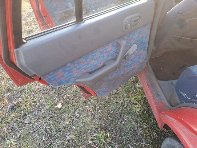 bontott SUZUKI SWIFT II Bal első Ajtó Kárpit