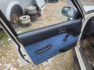 bontott SUZUKI SWIFT II Bal első Ajtó Kárpit