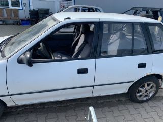 bontott SUZUKI SWIFT II Bal első Ajtó (Részeivel)