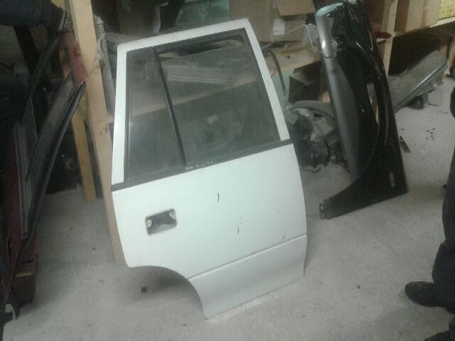 bontott SUZUKI SWIFT II Bal első Ajtó (Részeivel)