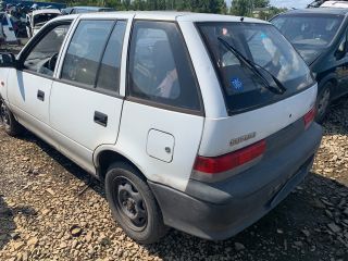 bontott SUZUKI SWIFT II Bal első Ajtó (Részeivel)