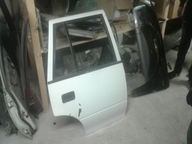 bontott SUZUKI SWIFT II Bal első Ajtó (Részeivel)