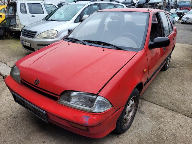 bontott SUZUKI SWIFT II Bal első Dobbetét (Kerékjárati, Műanyag)