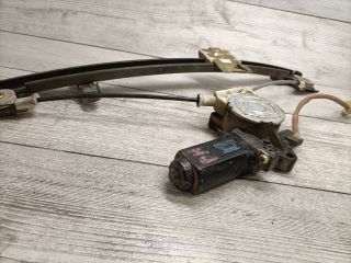 bontott SUZUKI SWIFT II Bal hátsó Ablakemelő Szerkezet (Elektromos)