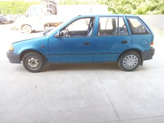 bontott SUZUKI SWIFT II Bal hátsó Ablakemelő Szerkezet (Mechanikus)