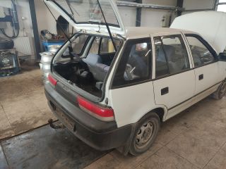 bontott SUZUKI SWIFT II Bal hátsó Ablakemelő Szerkezet (Mechanikus)