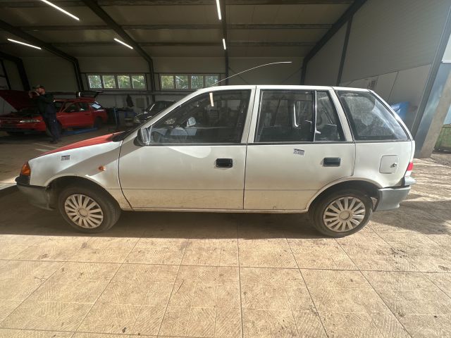 bontott SUZUKI SWIFT II Bal hátsó Ablakemelő Szerkezet (Mechanikus)