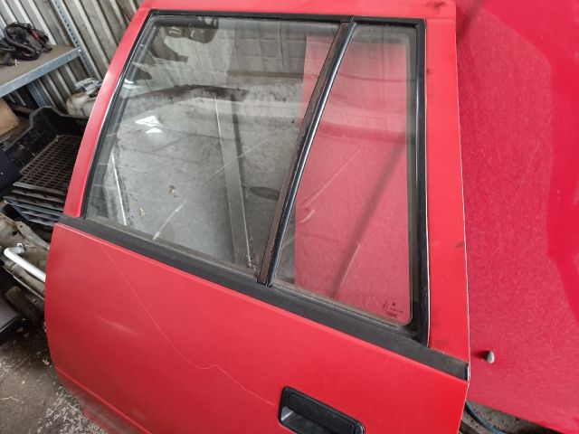 bontott SUZUKI SWIFT II Bal hátsó Ajtó (Részeivel)