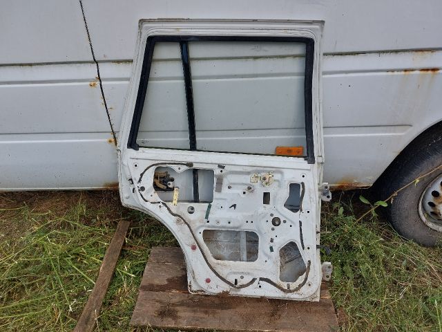 bontott SUZUKI SWIFT II Bal hátsó Ajtó (Részeivel)