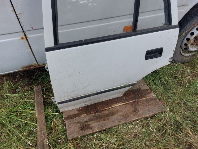 bontott SUZUKI SWIFT II Bal hátsó Ajtó (Részeivel)