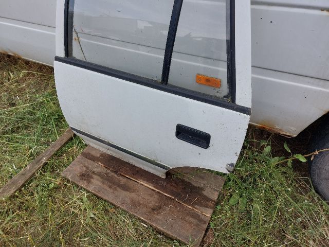 bontott SUZUKI SWIFT II Bal hátsó Ajtó (Részeivel)