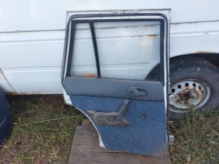 bontott SUZUKI SWIFT II Bal hátsó Ajtó (Részeivel)