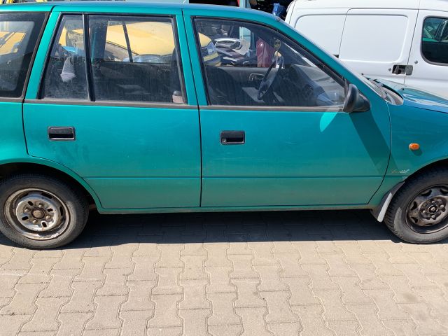 bontott SUZUKI SWIFT II Bal hátsó Külső Kilincs