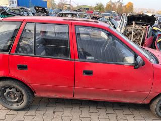 bontott SUZUKI SWIFT II Bal hátsó Külső Kilincs
