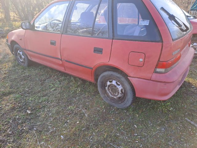 bontott SUZUKI SWIFT II Bal hátsó Lökhárító Tartó (Műanyag)