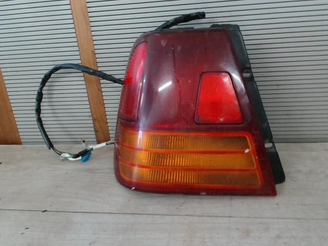 bontott SUZUKI SWIFT II Bal Külső Hátsó Lámpa