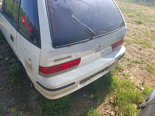 bontott SUZUKI SWIFT II Csomagtérajtó Kárpit