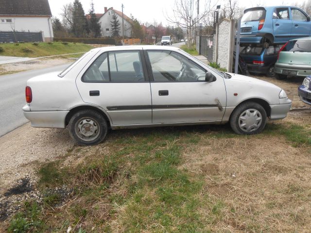 bontott SUZUKI SWIFT II Jobb első Ablakemelő Motor